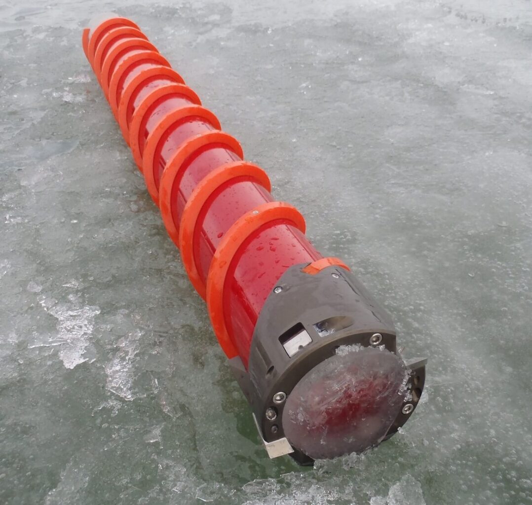 Kovacs ice coring drill with ice sample inside of it